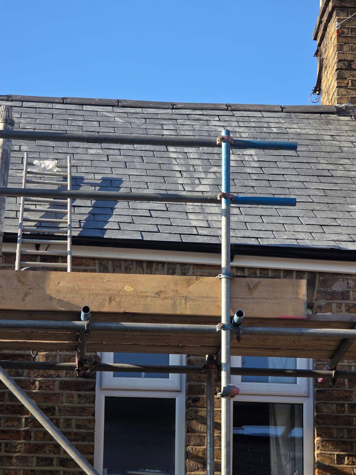 Scaffolded Bristol property mid re-roof with new timber and slate